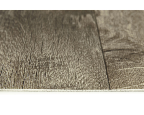 Närbild av ett vinylgolv med träutseende