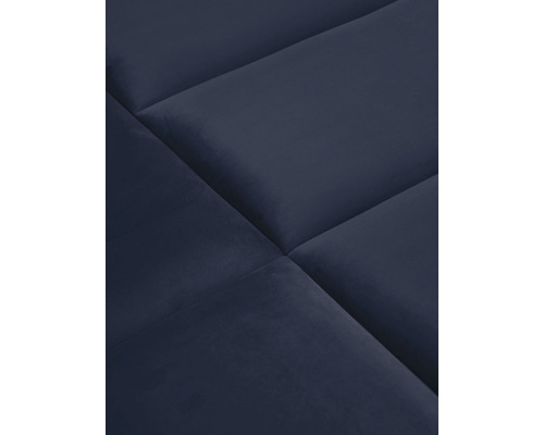 Detaljvy av ett quiltat möbeltyg