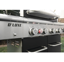 Närbild av en Deluxe gasolgrill med kontrollknappar