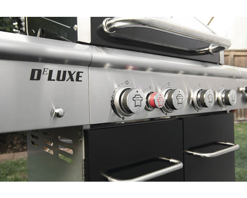 Närbild av en Deluxe gasolgrill med kontrollknappar