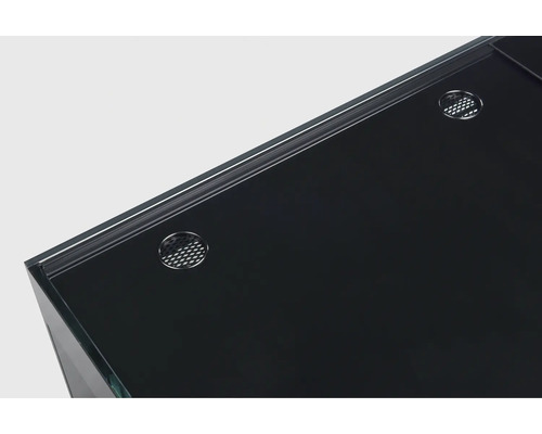 Detaljvy av ett akvarium med lock och ventilationshål