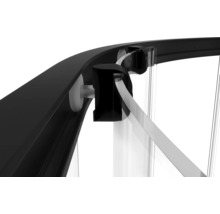 Detalj av duschkabin med ram och glas