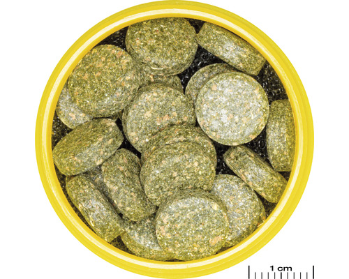 Fiskmatstabletter i gul behållare