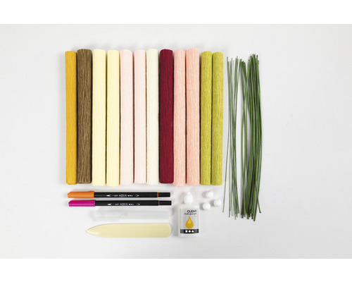 Pappersset med crepepapper, blomstertråd, lim och pennor för blomsterkonstprojekt