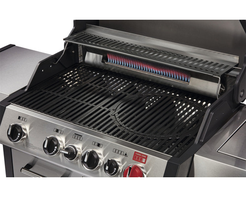 Detaljvy av gasolgrill med grillgaller, varmhållningsgaller och kontrollknappar