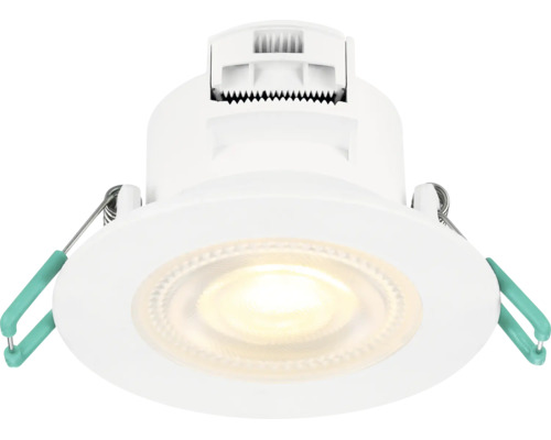 LED downlight för takmontering med varmvitt ljus och sidomonterade fjäderklämmor för installation.