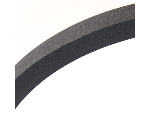 Närbild av en ring i plast