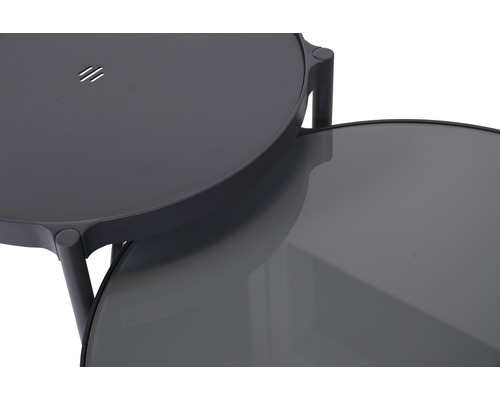 Detaljvy av ett sidobord med två runda skivor