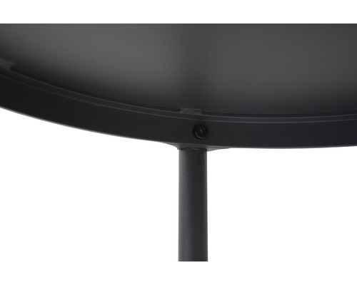 Detaljvy av ett runt bord med metallram