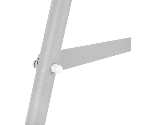 Detaljvy av en grå metallstolsben med skruv och vit stopp