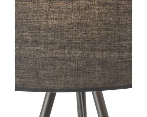 Närbild av en golvlampa med textilskärm