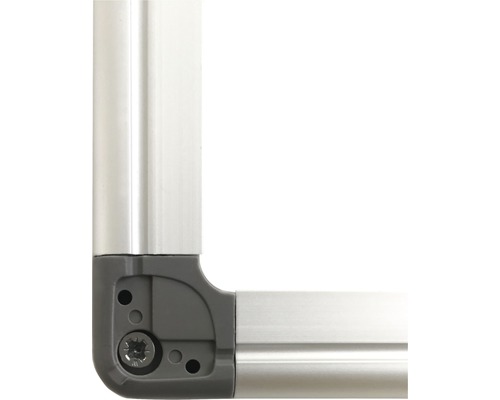 Detaljvy av ett hörn på en ram med skruv