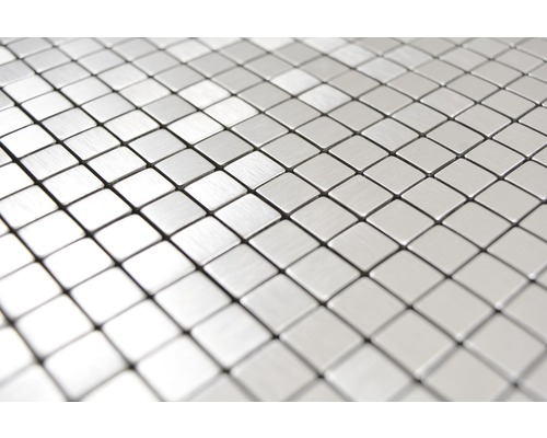 Detaljbild av mosaikplattor av metall