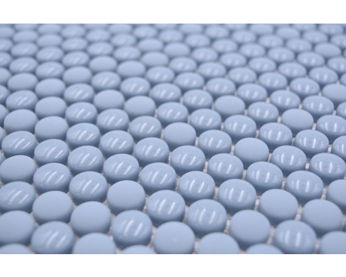 Närbild av ljusblå mosaikplattor