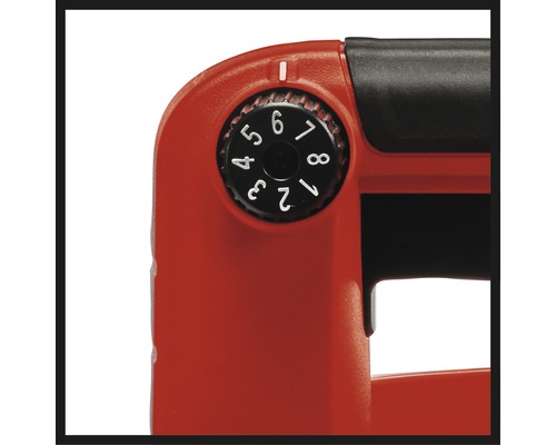 Detaljvy av en häftpistol med justerbar slagkraftregulator