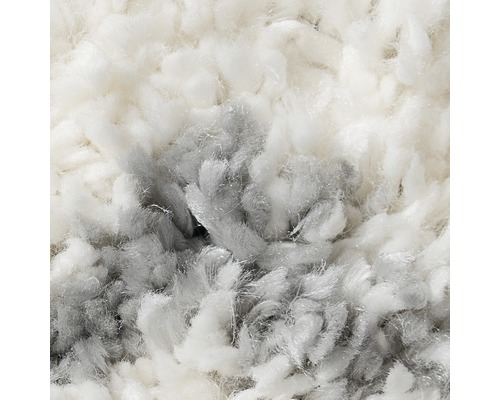 Detaljbild av en hög luggmatta med textil struktur