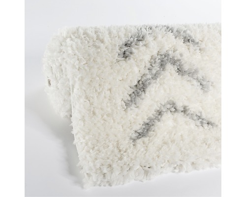 Vit matta med grått mönster