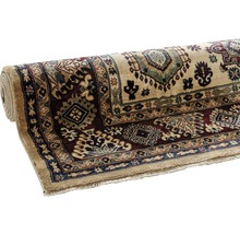 Rullad matta med orientaliskt mönster