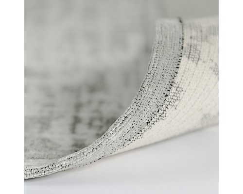 Detaljvy av en mönstrad matta