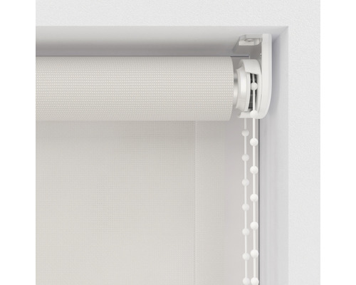 Detaljvy av en rullgardin med kedjedrag för fönsterdekoration