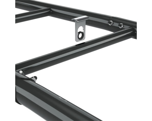 Detaljvy av en bagagehållare med fästelement.