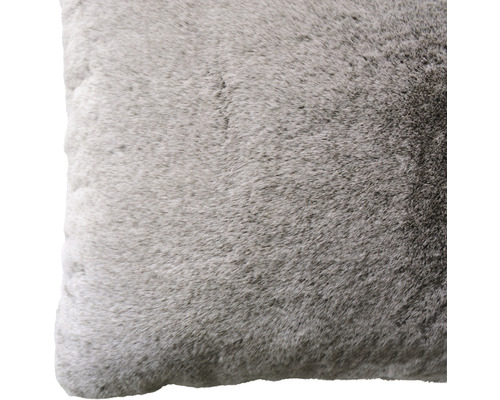 Dekorativ kudde med pälsstruktur