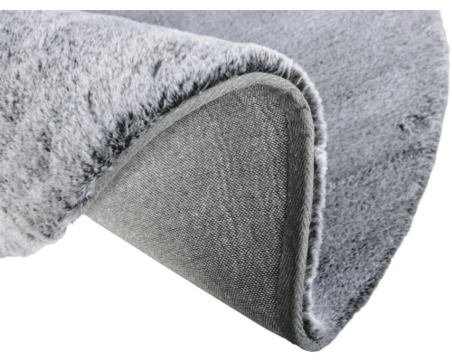 Grå matta med kort lugg och textilbaksida