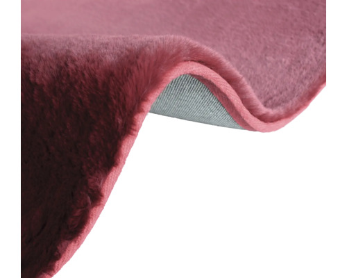 Detaljvy av en matta med lugg