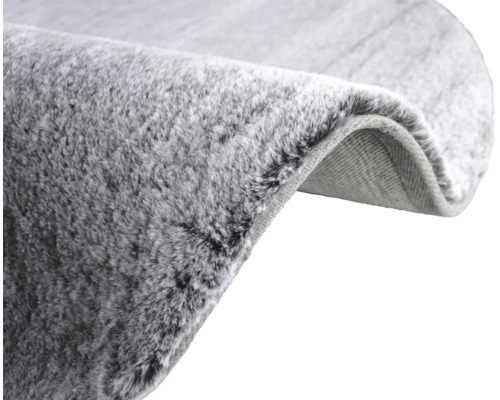 Detaljvy av en grå matta med mjuk yta