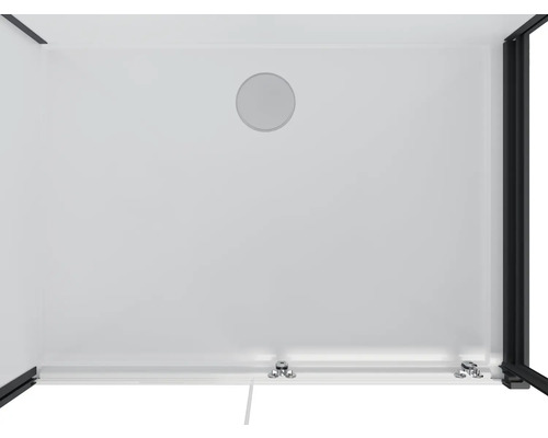 Interiör av en duschkabin med rund öppning och beslag på golvet