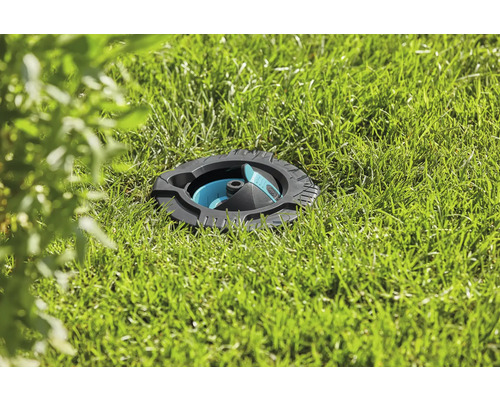 Pop-up sprinkler i gräsmattan