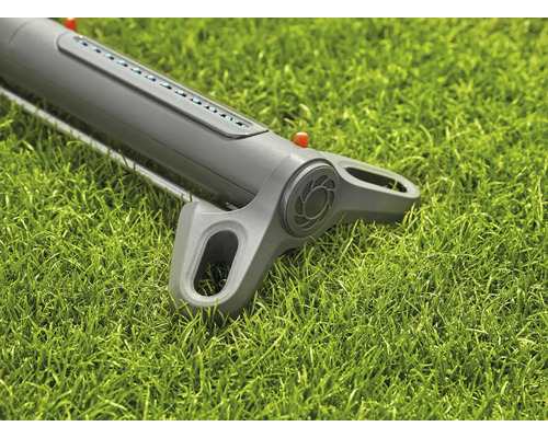 Trädgårdsspridare på gräs