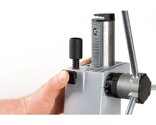 Detaljvy av en borrmaskin med manuell manövrering