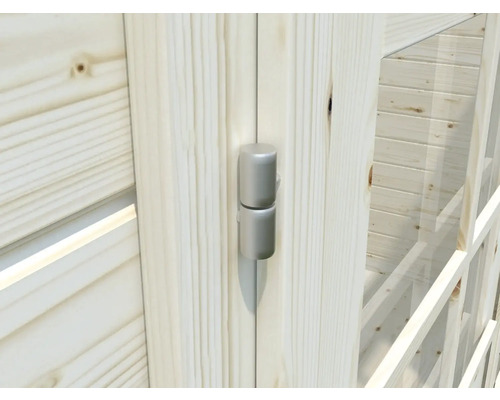 Detaljvy av en dörr med silverfärgat metallgångjärn och trä