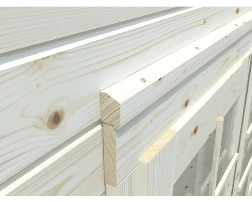 Detaljvy av en trävägg med spont och not och träramar