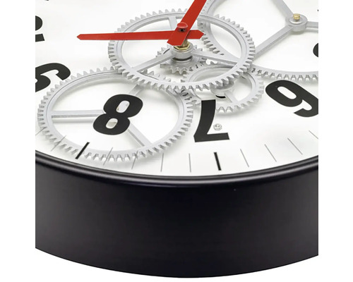 Väggklocka med öppet urverk, svart ram och röd visare