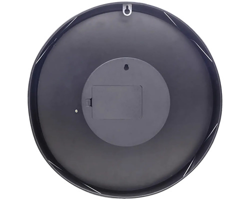 Baksidan av en rund väggklocka med batterifack och upphängningsanordning