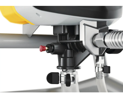 Detaljvy av en färgspruta med svart regulator och röd avluftningsknapp