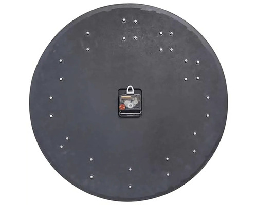 Baksida av en rund väggklocka med urverk