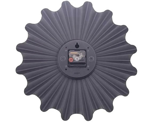 Baksidan av en grå väggklocka i solrosdesign