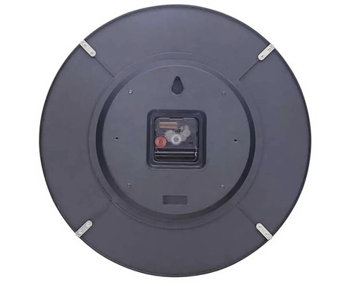 Baksidan av en rund väggklocka med urverk och upphängningsanordning