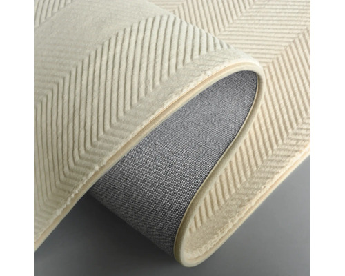 Detaljvy av en matta med sicksackmönster