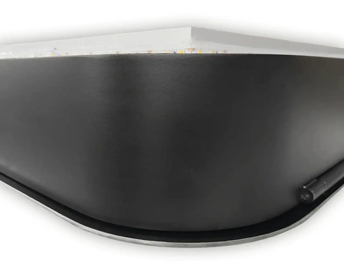 Detaljvy av ett svart akvarielock med belysning