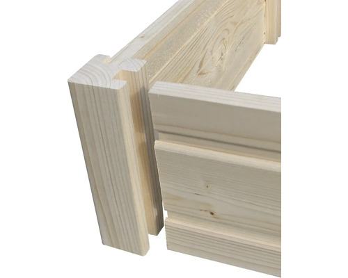 Detaljvy av en trävägg med not och fjäder