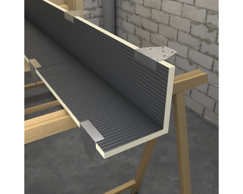 Takfotsprofil med fästen på en träram framför en tegelvägg