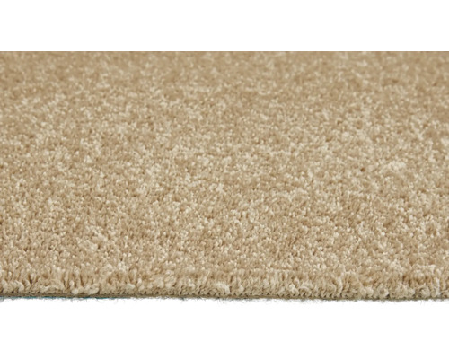 Närbild av en beige matta