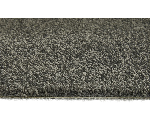 Närbild av en grå heltäckningsmatta.