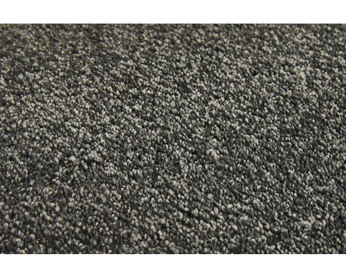 Närbild av en grå matta med lugg