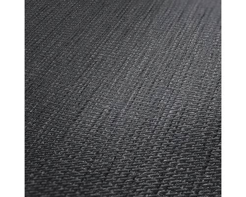 Närbild av ett svart tyg med diagonal textur