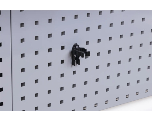 Verktygshållare på en perforerad vägg